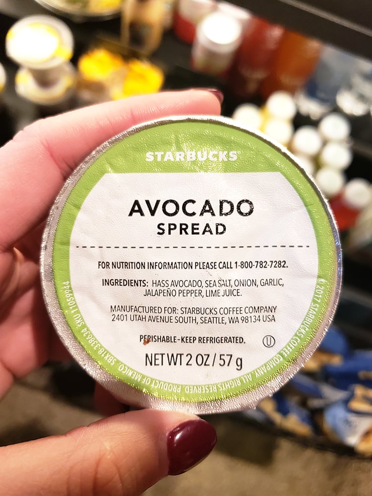 holding starbucks avocado spread