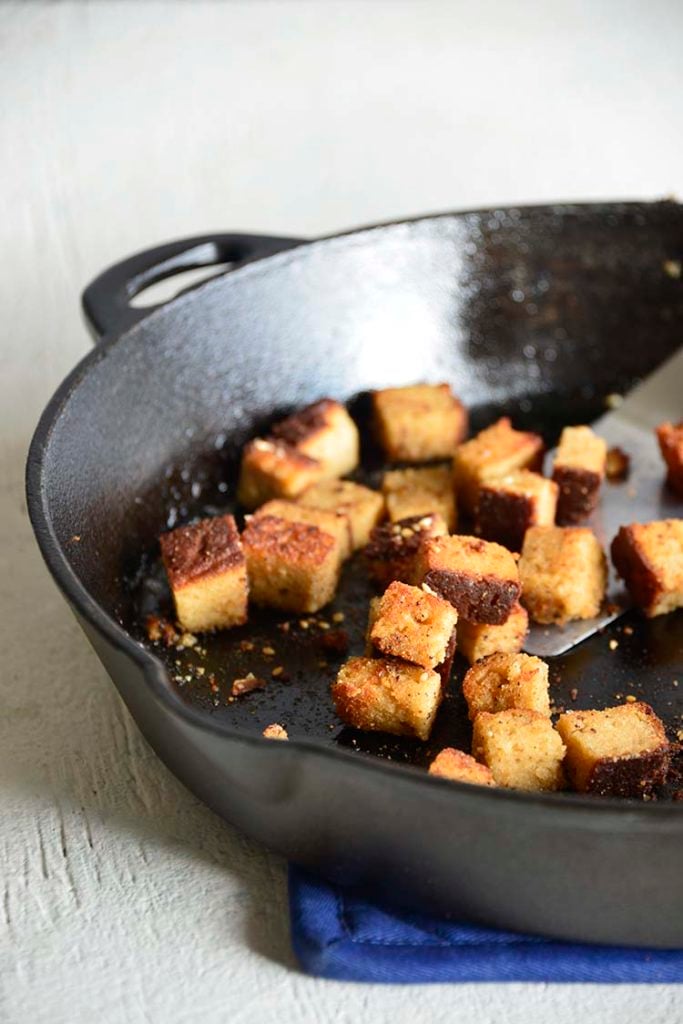 bacon croutons in a cast iron skillet