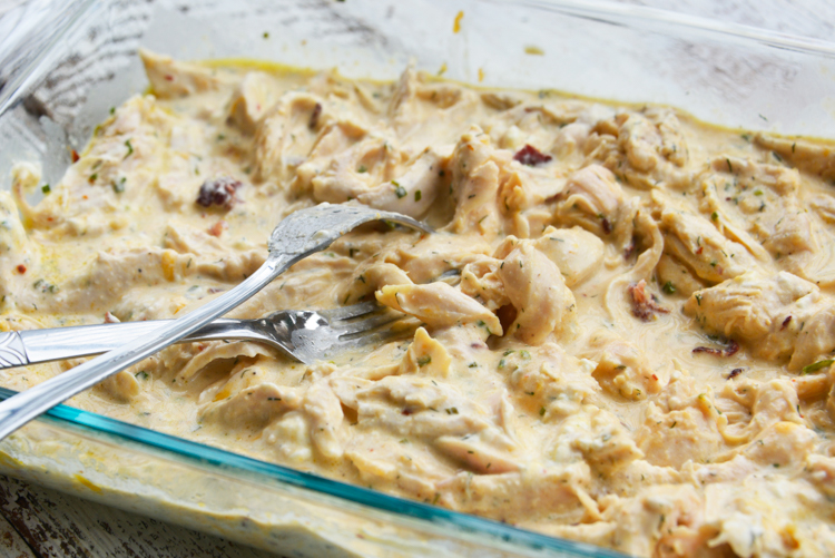 fully baked chicken in a glass baking dish