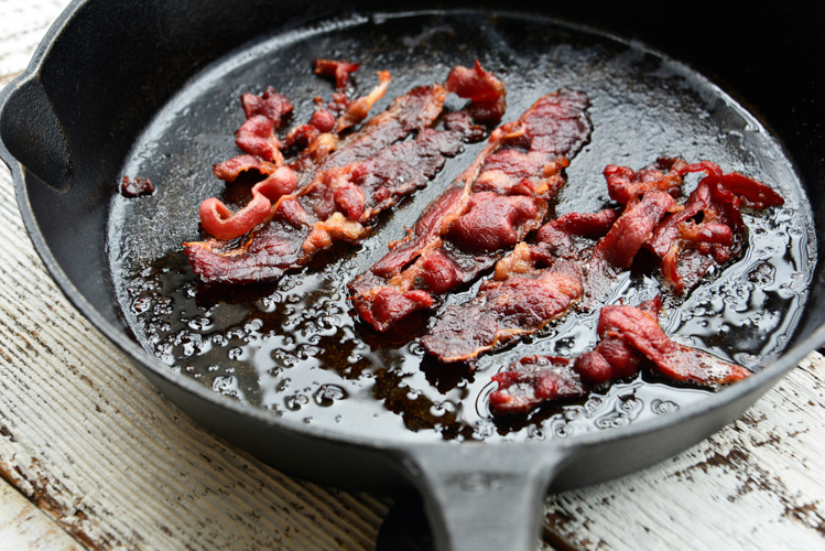 crispy bacon cooked on cast iron pan