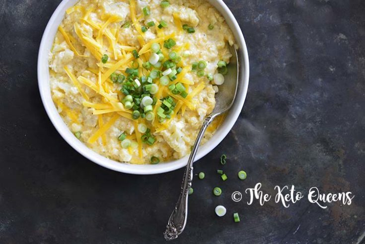 keto mac and cheese recipe in a white bowl topped with scallions