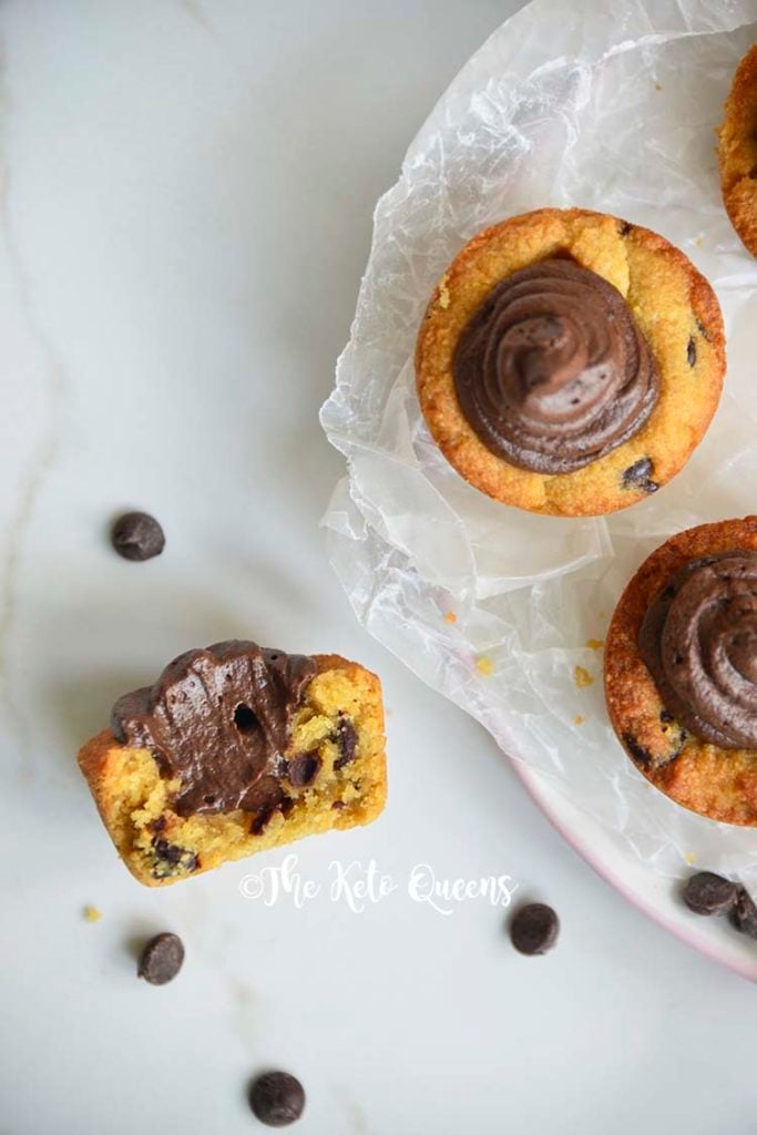 Chocolate Chip Cookie Cups with Chocolate Buttercream frosting with a bite taken out