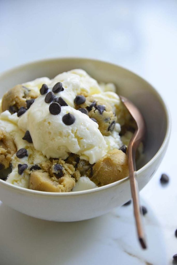 easy keto chocolate chip cookie dough ice cream in a bowl with a rose gold spoon