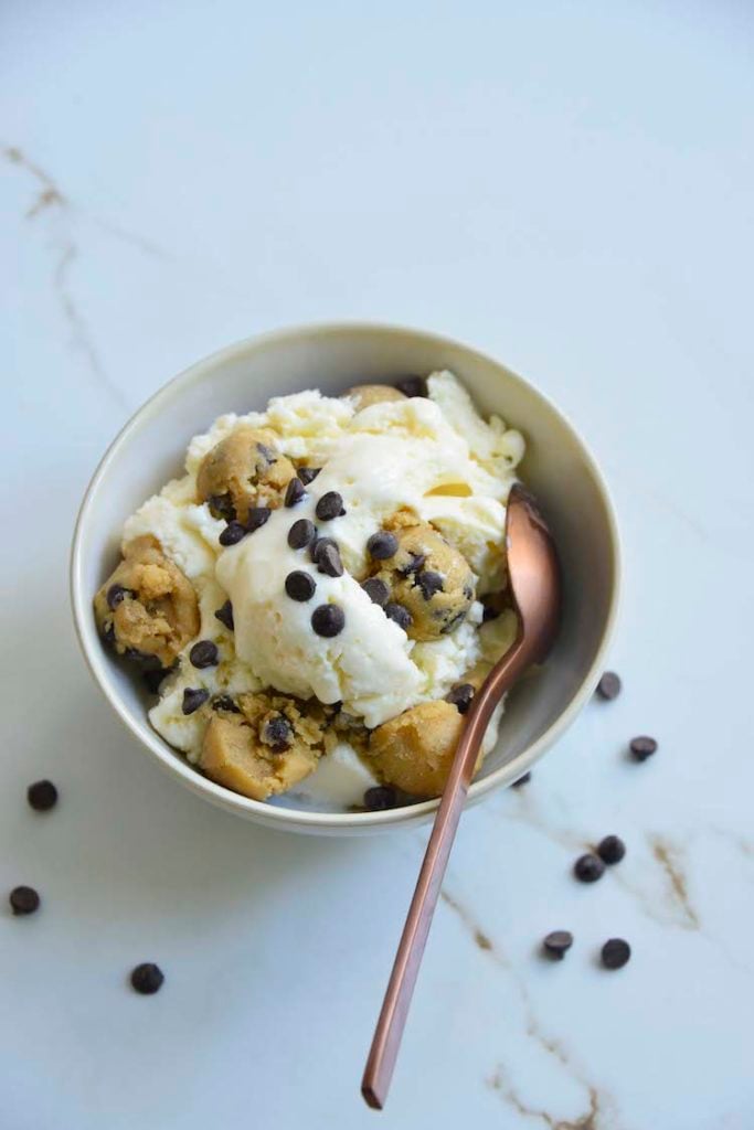 easy keto chocolate chip cookie dough ice cream in a bowl with a rose gold spoon