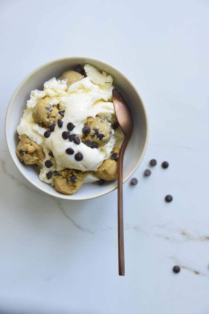 easy keto chocolate chip cookie dough ice cream in a bowl with a rose gold spoon