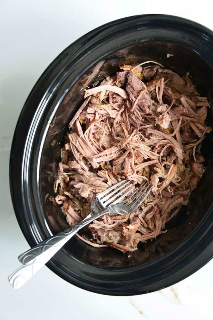 shredded pork slow cooker pork but in a black shell