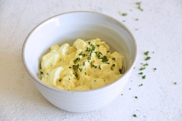 image of keto egg salad in a white bowl