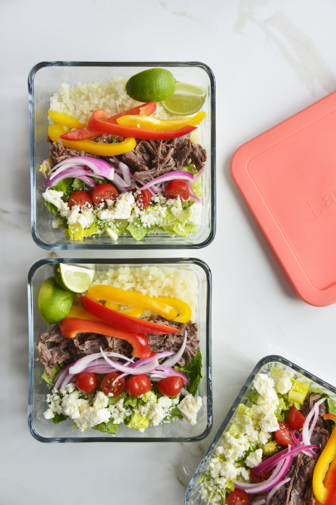 3 prepared keto chipotle bowls in square glass meal prep containers with lids