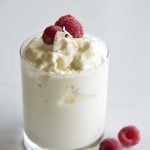 Front View of Keto Vanilla Milkshake Recipe with Red Raspberries