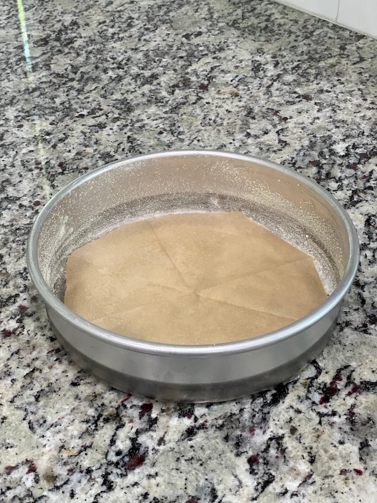 a round pan lined with parchment paper