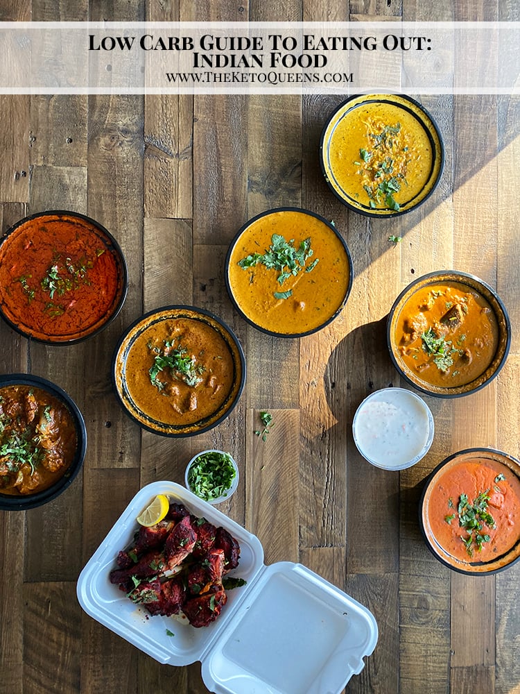 Variety of Indian Curries and Chicken Tandoori on Wooden Table