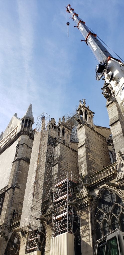 notre dame being rebuilt after fire damage