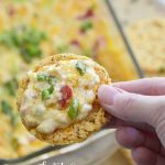 An Easy Pimento Cheese Dip so good you'll want to eat it with a spoon! Bursting with flavor, this savory dip will be a hit at your next party!