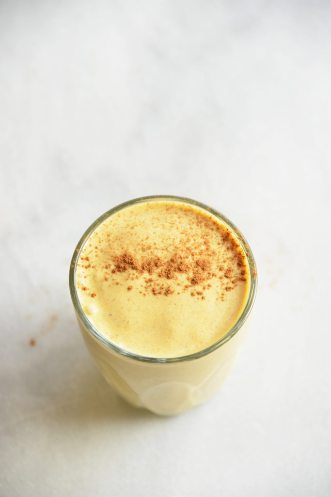 keto pumpkin smoothie in a clear glass