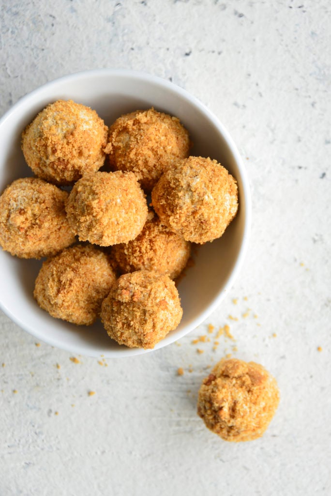 Keto Pumpkin Spice Cream Cheese Fat Bombs in a white bowl