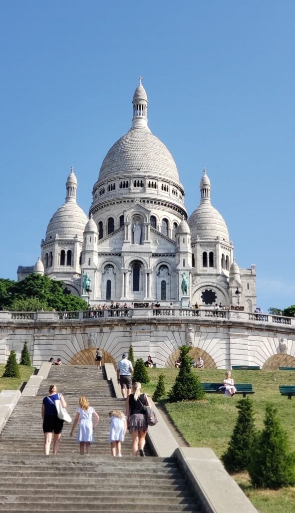 view of sacre coeur from the bottom of the step