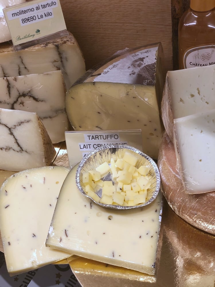 Tartuffo Cheese on Shelf in French Cheese Shop