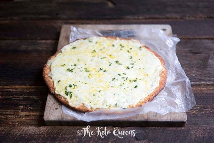 an image of a whole keto 3 cheese white pizza on a fathead pizza crust
