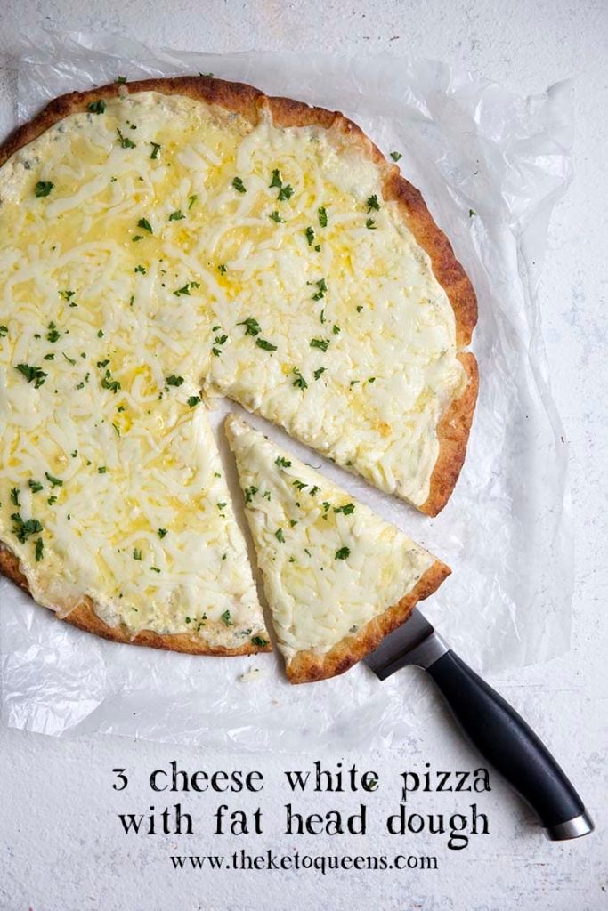 an image of a keto 3 cheese white pizza on a fathead pizza crust