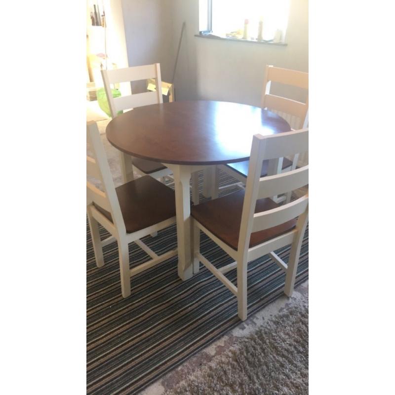Mahogany and cream table and chairs