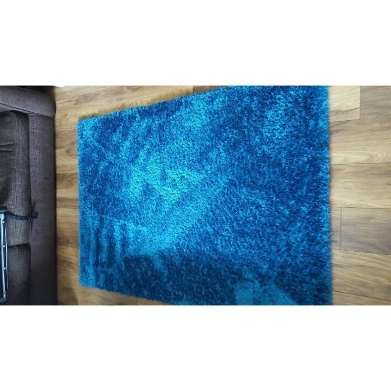 Teal rug in ex condition only 3 months old 120 x170cm