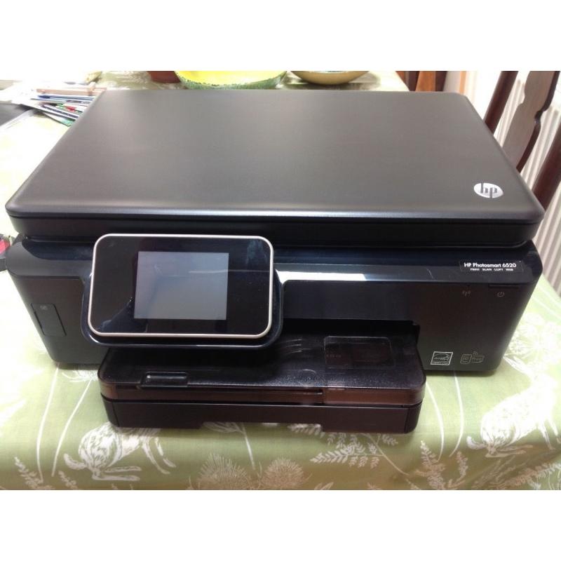 HP Photosmart 6520. Prints, scans and copies docs. Wifi enabled.