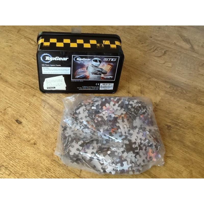 A BBC TOP GEAR THE STIG JIGSAW PUZZLE IN A TIN WITH 500 PIECES - NEW & NOT BEEN OPENED