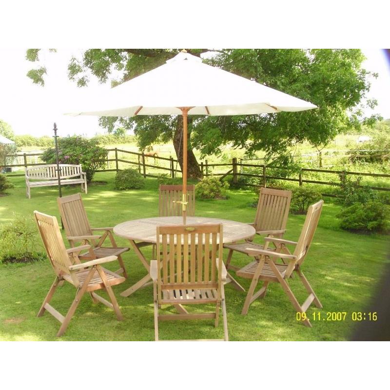 Garden table and six reclining chairs