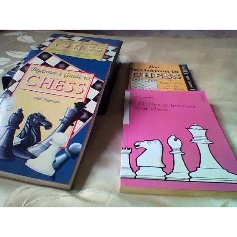 Chess set in new condition with book and 2 other chess books