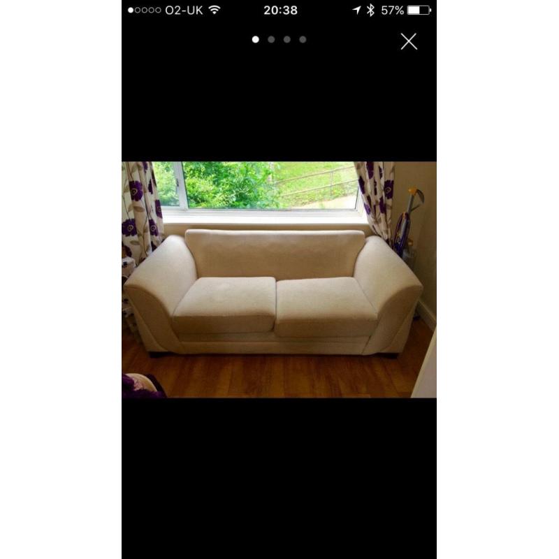 Two beige sofas