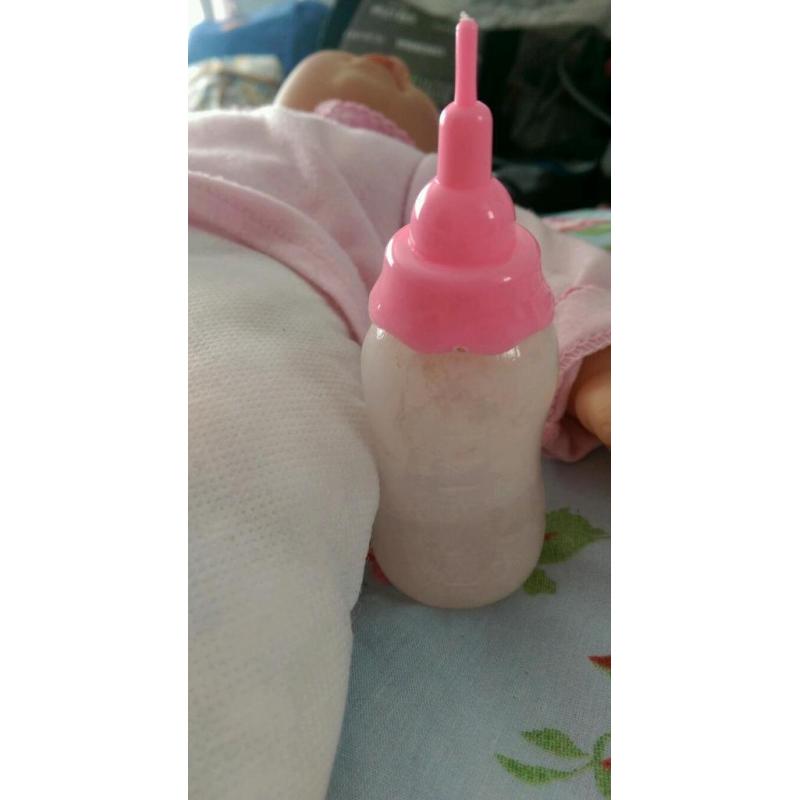 Baby doll with milk bottle