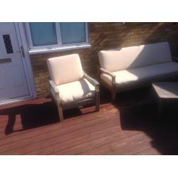 Solid teak garden set, bench two chairs table including cushions. Cushions need attention.