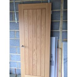 Internal oak veneer style door with brushed chrome handles and hinges fitted