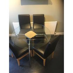 Glass Top table & four chairs