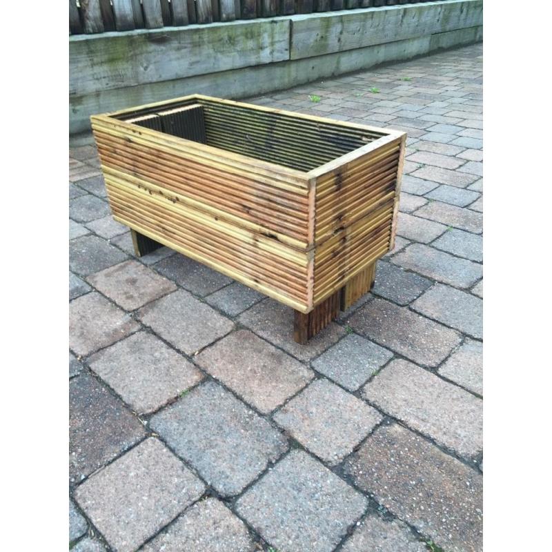 Planters made from recycled decking