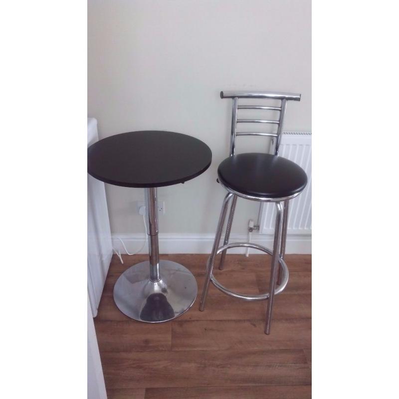 High table and one stool