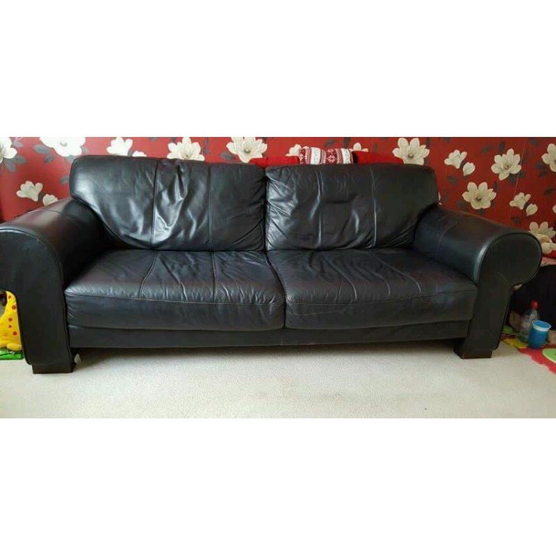 Large real leather black sofa