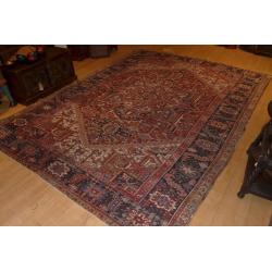 70 year old large Heriz rug