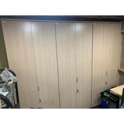 Limed oak tall storage cabinet with keys