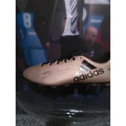 Singed Steven Gerrard boot in dome photo