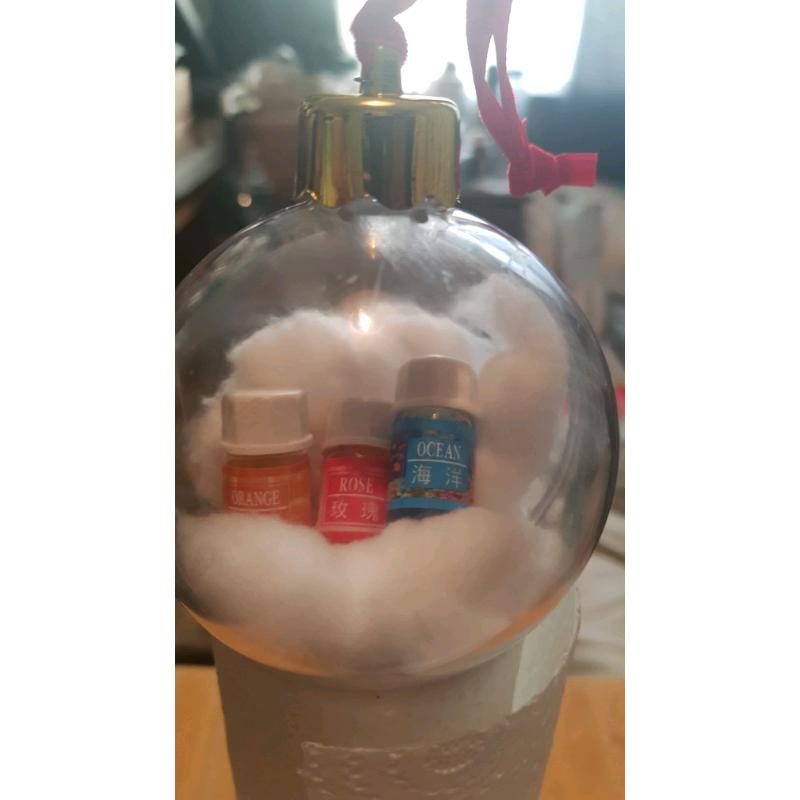 Christmas baubles with essential oils in