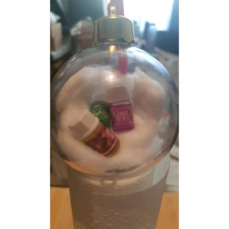Christmas baubles with essential oils in