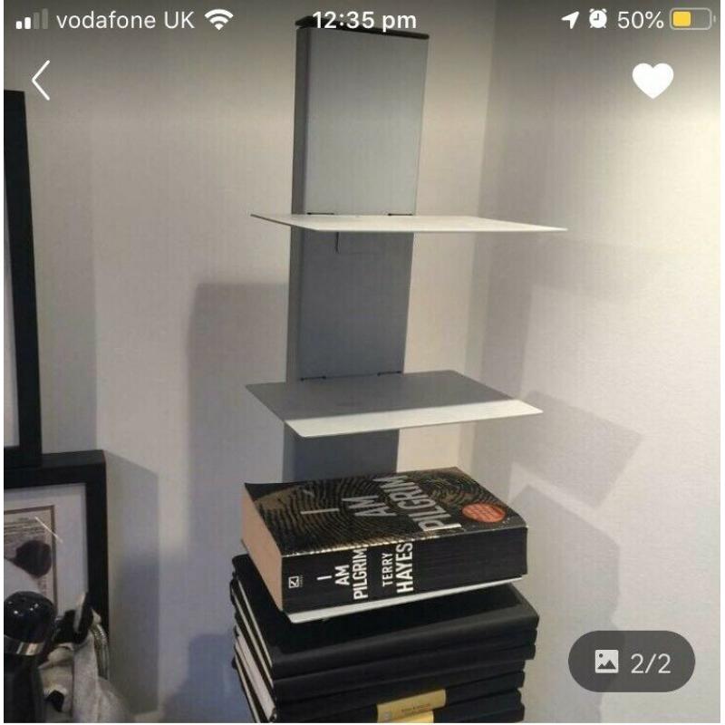 Floating metal bookcase