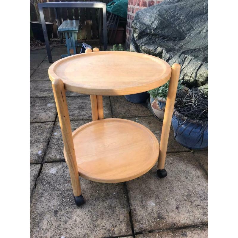 Double level wheelie light wood coffee table for sale