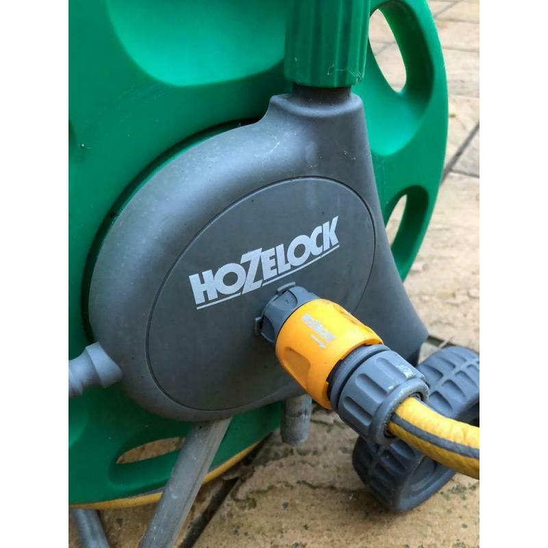 Hozelock garden hose and reel.
